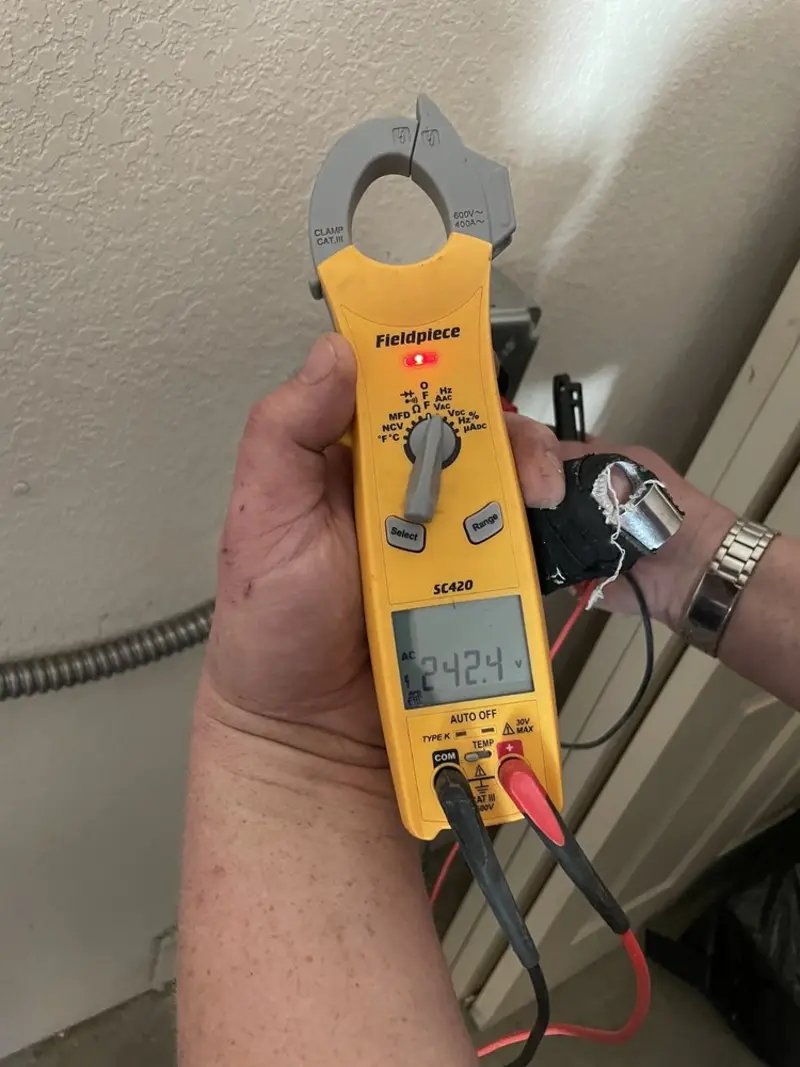 Voltage testing with clamp meter during Aluminum Wiring Replacement in Williamston